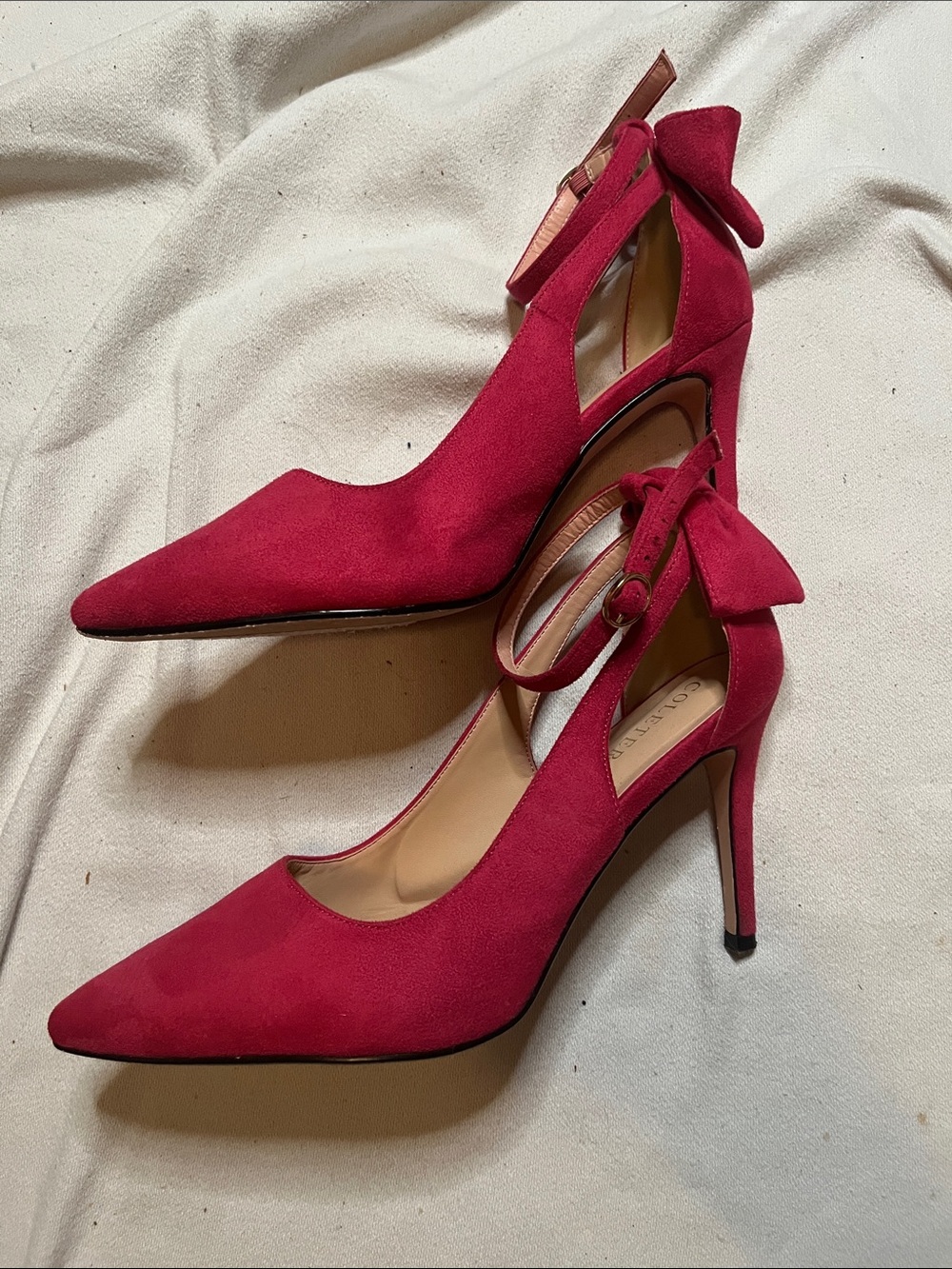 Pointed-Toe Fuchsia Suede Ankle-Strap Heels with Bow Accent